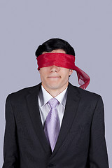 Image showing blindfold businessman