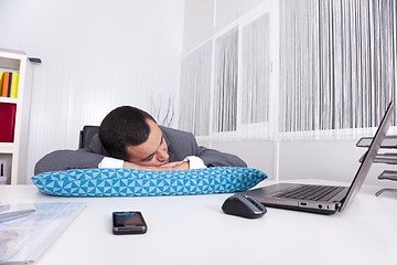 Image showing Businessman sleeping at the office