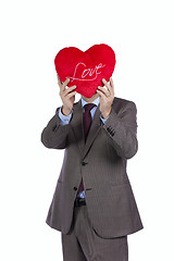Image showing Businessman with love heart face