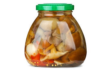 Image showing Glass jar with mushroom assortment (Suillus and honey agarics) isolated on the white background