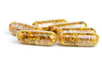 Image showing Some homeopathic pills with bee pollen