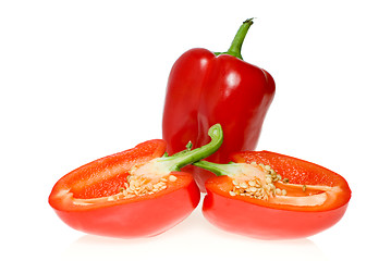 Image showing Whole red sweet pepper and two halves