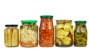 Image showing Five glass jars with marinated vegetables