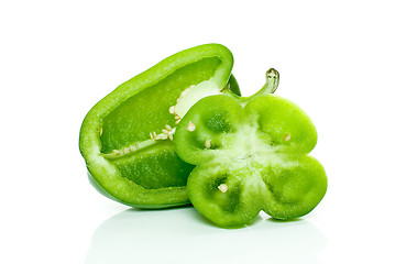 Image showing Half of green sweet pepper and flower-shaped slice