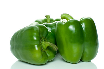 Image showing Three green sweet peppers