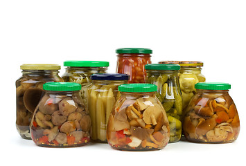 Image showing Glass jars with marinated vegetables and mushrooms