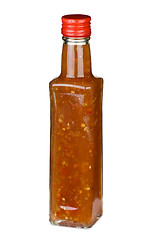 Image showing Piquant ketchup with vegetable pieces