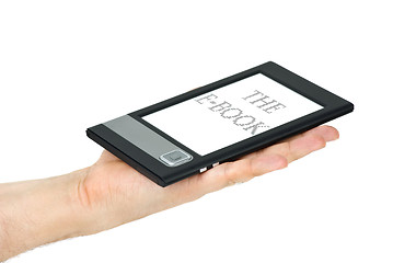 Image showing E-book reader lie on palm