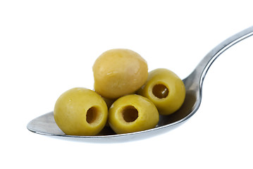 Image showing Five marinated pitted green olives in the metal spoon