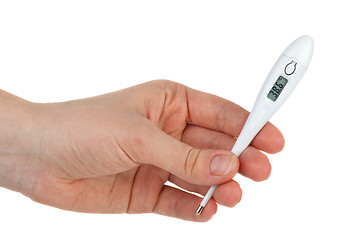 Image showing Hand hold electronic thermometer with high temperature on display