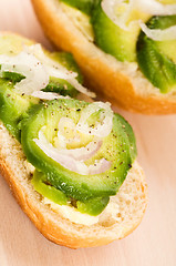 Image showing Sandwich with avocado on a wooden board 