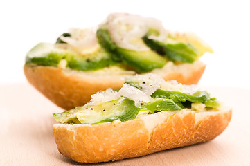 Image showing Sandwich with avocado on a wooden board 