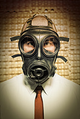 Image showing businessman with gas mask