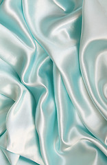 Image showing Smooth elegant blue silk as background 