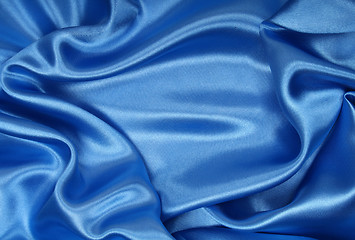 Image showing Smooth elegant blue silk as background 