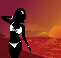 Image showing silhouette beautiful girl at sunset on beach