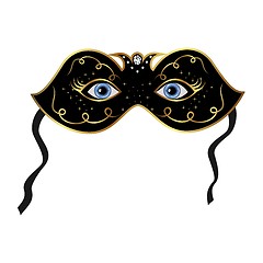 Image showing Blue eyes hidden under theatrical mask