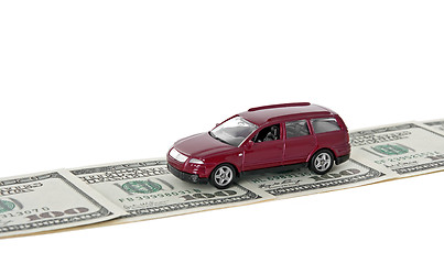 Image showing Red car on money road