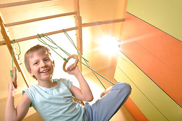 Image showing child playing and exersicing at home