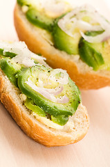Image showing Sandwich with avocado on a wooden board 