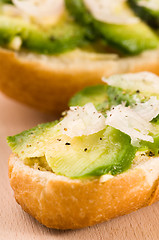 Image showing Sandwich with avocado on a wooden board 