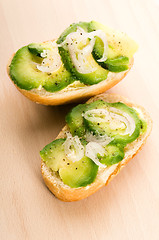 Image showing Sandwich with avocado on a wooden board 