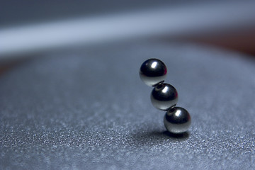 Image showing floating metal balls make a perfect balance