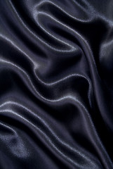 Image showing Smooth elegant black silk as background