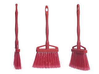 Image showing Three plastic red brooms