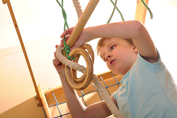 Image showing child playing and exersicing at home