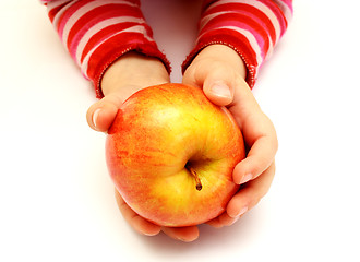 Image showing child is holding fresh apple