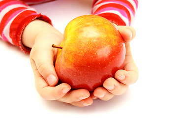 Image showing child is holding fresh apple