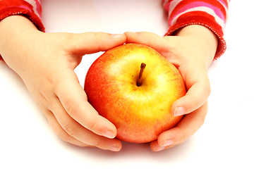 Image showing child is holding fresh apple