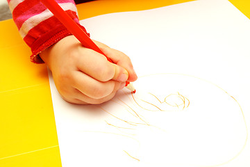 Image showing hand of child drawing on a paper