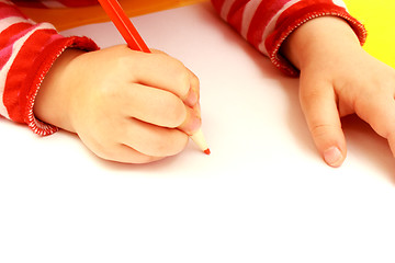 Image showing hand of child drawing on a paper