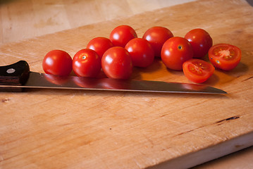 Image showing tomatoes on cutting board