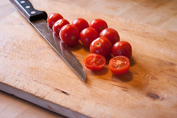 Image showing tomatoes on cutting board