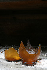 Image showing broken bottle on shelf