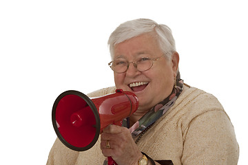 Image showing Female senior with megaphone