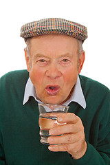 Image showing Male senior drinking water 