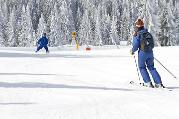 Image showing child learning to ski