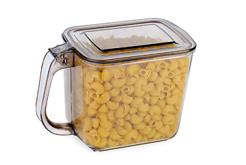 Image showing Kitchen container ful of uncooked macaroni