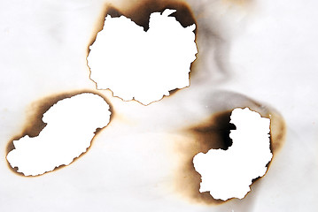 Image showing burnt holes