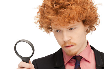 Image showing man with magnifying glass