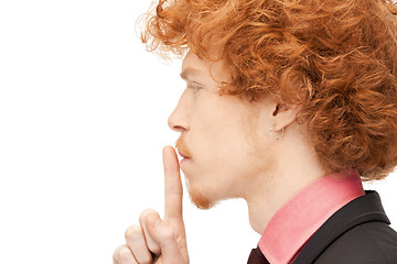 Image showing finger on lips