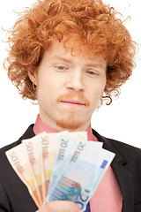 Image showing handsome man with euro cash money