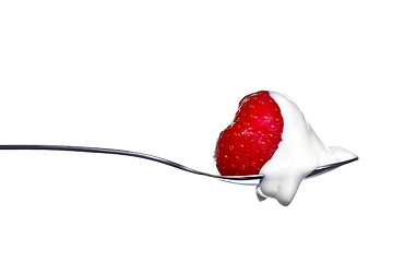 Image showing Strawberry and cream on spoon