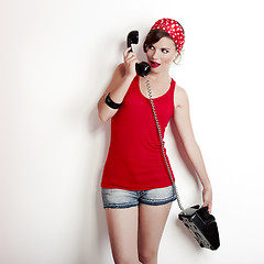 Image showing Girl with a vintage phone