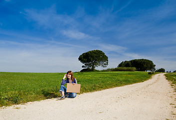 Image showing Hitch hiking girl