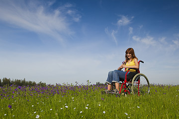 Image showing Handicapped woman on wheelchair